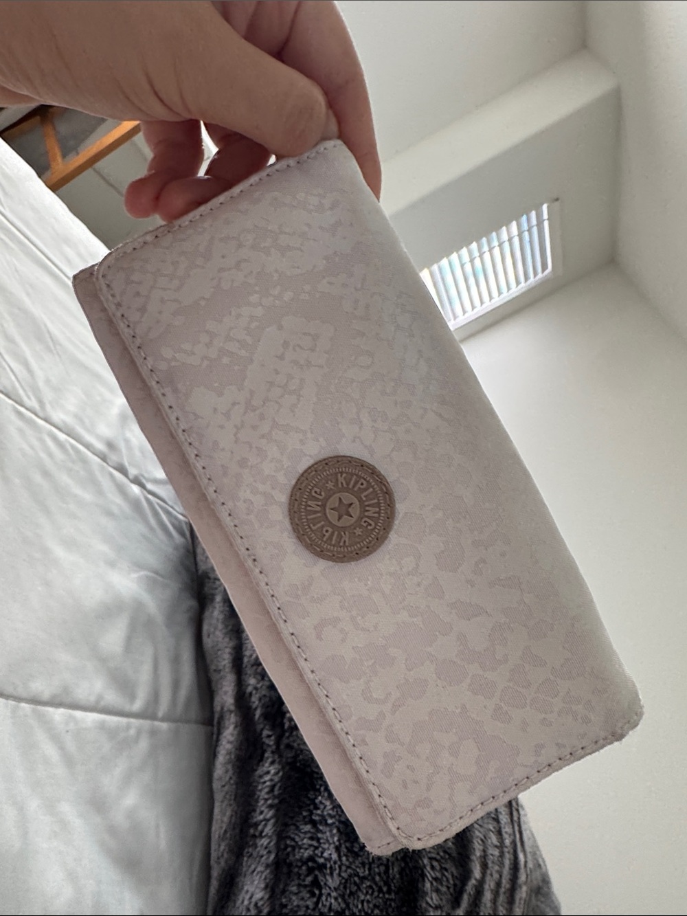 Kipling Pale Pink Long Wallet with Subtle Pattern